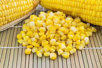 close up of canned corn and sweet corn on Makisu background, selective focus (detailed close-up shot)