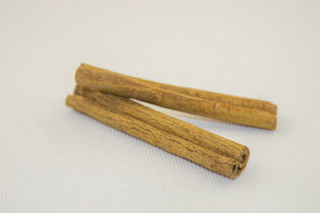 Cinnamon sticks on a white background