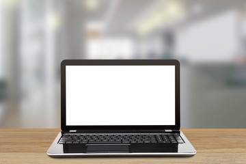 Fototapeta premium Laptop with blank white screen on blurred modern office background, business concept