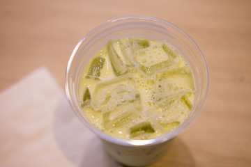 Ice green tea with milk
