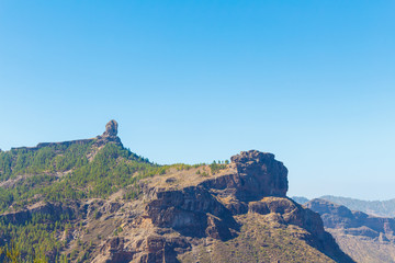 Rock Nublo, Gran Canaria, Spain, view from degollada de brecerra, sunny summer day, after forest fire