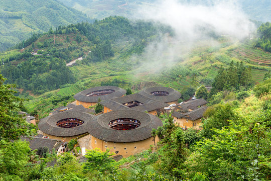 fujian tulou (hakka roundhouse). The Red paper with chinese words are couplets with lucky poem