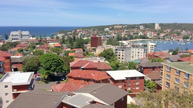 Sydney, Manly Beach buildings and coastline.