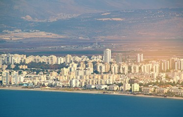 Obraz na płótnie Canvas Panoramic view from Haifa to coastline of Krayot in Israel.