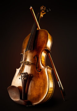 close up of a violin and bow