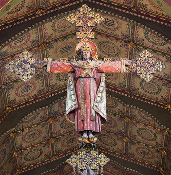 LONDON, GREAT BRITAIN - SEPTEMBER 17, 2017: The carved Crucifixion of Jeus as the king and priest in church St. Barnabas designed by Bodley in 1906.