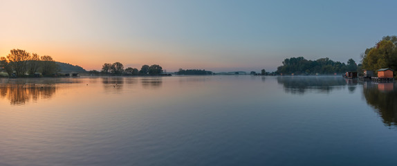 French countryside - Lorraine. Panorama of a small lake with fisherman's hut at sunrise.
