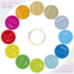 Colorful calendar for 2018 in Spanish. Circular design. Week starts on Sunday