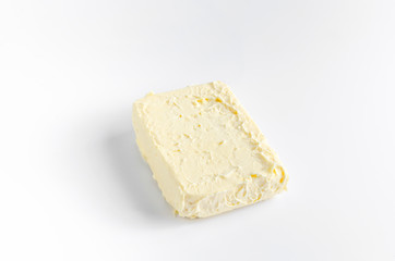 A piece of butter on white
