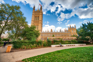 Fototapeta na wymiar Street view of Westminster Palace, London on a beautiful sunny day