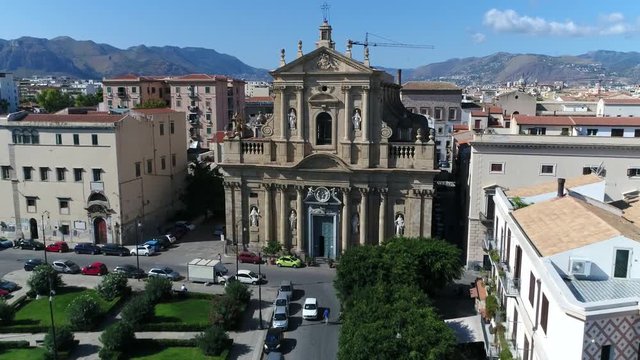 Aerial Palermo Italy flying towards Church of Saint Teresa in Italian Chiesa di Santa Teresa then moving over roof of Baroque church located in the quarter of Kalsa within historic centre 4k quality