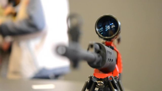 Submachine Gun on the table close-up macro
