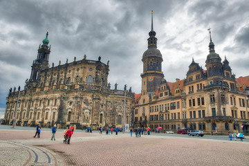 Fototapeta premium DRESDEN, GERMANY - JULY 15, 2016: City streets and buildings on a cloudy day. Dresden attracts 5 million people annually