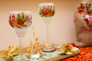 christmas decorated glasses on tray