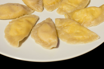 Dumplings with onion, quark and potato knows in Poland as Russian dumplings (Polish: Piergi ruskie).