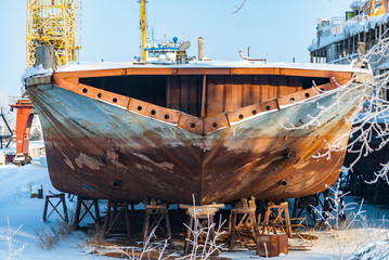 Rusty abandoned river ships