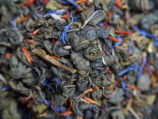 Tea of different kinds is poured into light cups.