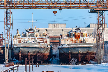 Rusty abandoned river ships