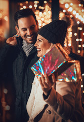 Happy Young Couple With Presents