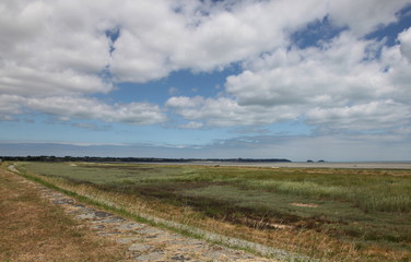 Fototapeta premium Promenade sur la grève de Saint Benoît des Ondes.