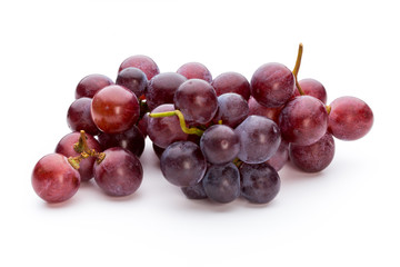 Ripe red grape isolated on white.