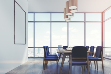 Dining room with a poster, palms, side toned