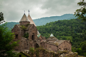 Fototapeta na wymiar Armenian monastery between the mountains in Armenia