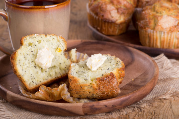 Lemon Poppy Seed Muffin on a Wooden Plate