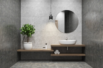 Concrete bathroom, sink, round mirror - obrazy, fototapety, plakaty