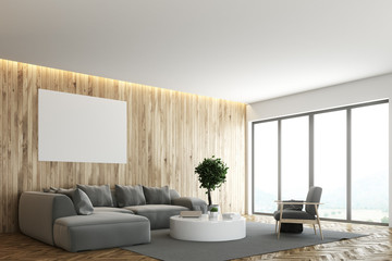 Wooden living room, gray sofa, poster side