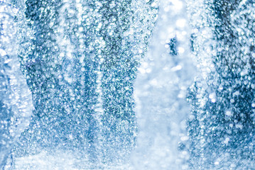 The gush of water of a fountain. Splash of water in the fountain, abstract image
