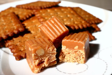 Cookies and candy on a white plate