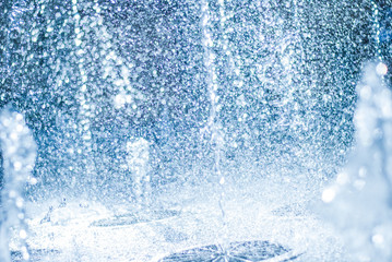 The gush of water of a fountain. Splash of water in the fountain, abstract image