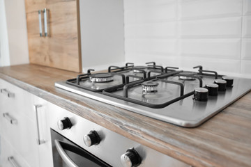 Modern stylish gas stove in kitchen