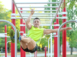 Fototapeta premium Sporty young man training outdoors