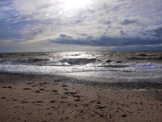 Fototapeta na wymiar Beautiful sky and the sea with rolling waves (Saki, Crimea ).