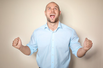 Fototapeta premium Young man on light background