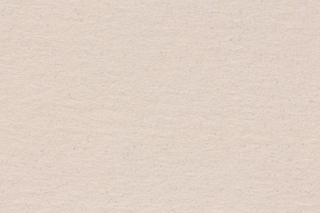 Fototapeta premium Beige paper texture background, close up.