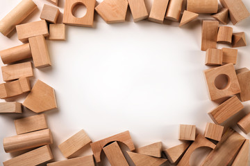 Wooden blocks for kindergarten on white background