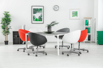 Modern room interior with big table and chairs