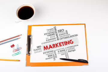 Marketing word cloud, Business concept. Office desk with stationery.