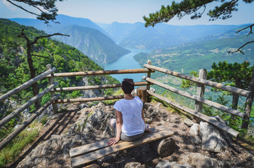 Woman looking beautiful landscape in peace