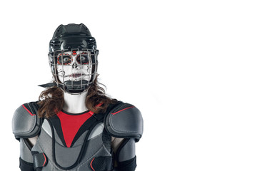 Happy halloween. hockey player in a hockey helmet and mask against isolated backdrop or background. All Saints' Day