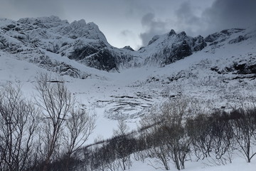 W-wards view from 807-Nusfjordveien road: Storvatnet-lake and mounts Bjorntinden-Sautinden....