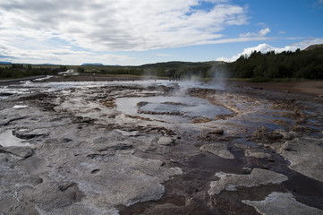 Typical Icelandic landscape, a wild nature of rocks and shrubs, rivers and lakes.