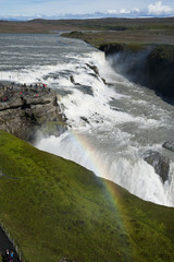 Typical Icelandic landscape of Gullfos Falls, a wild nature of rocks and shrubs.