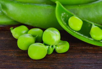 Snow peas on wood