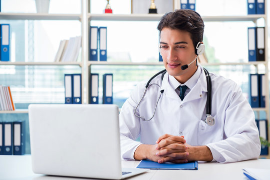 Young male doctor in telehealth concept