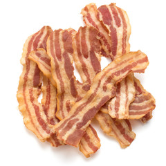 cooked crispy slices of bacon isolated on white background