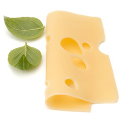 Cheese and basil leaves isolated on white background